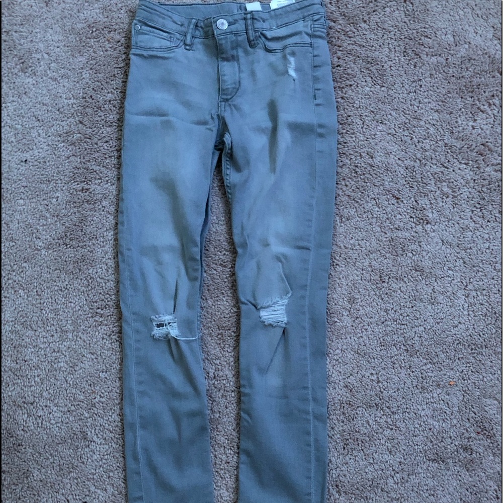 grey ripped jeans